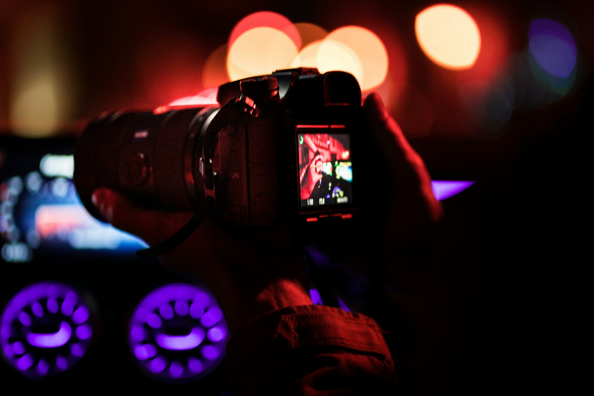 a person taking a picture with a camera