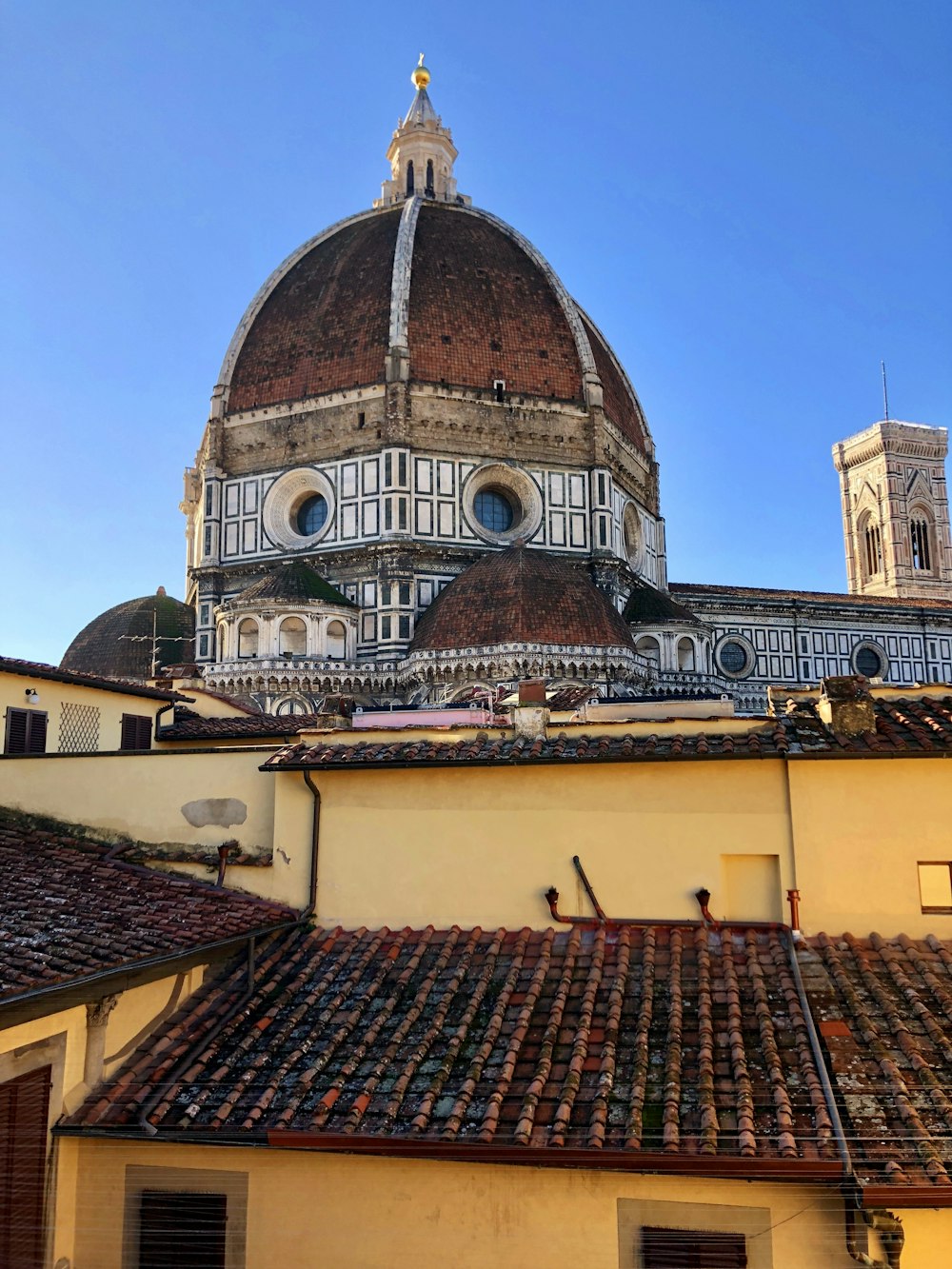 the dome of a building with a clock on it