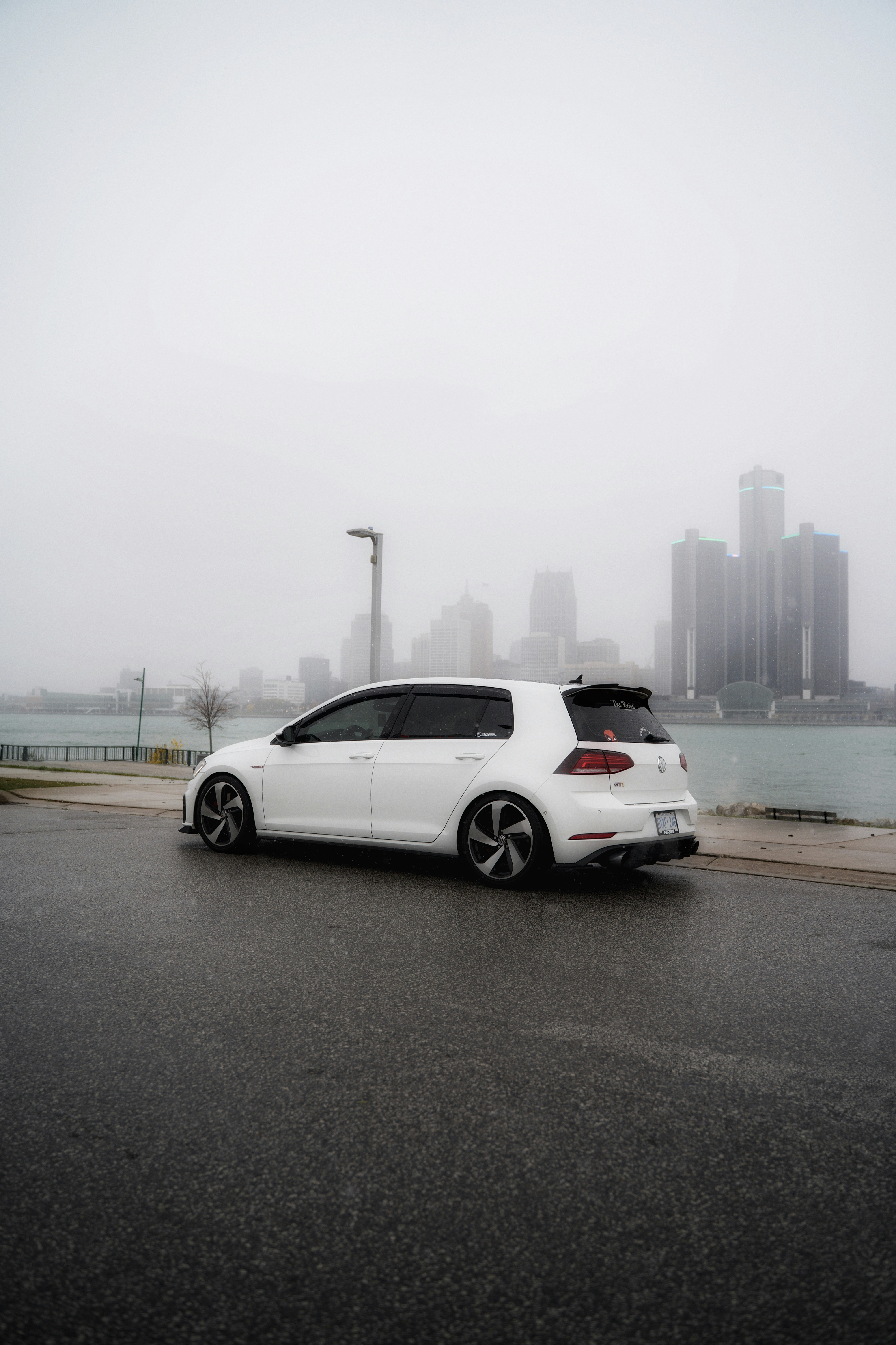 A white car parked on the side of the road photo – Free Car Image on ...