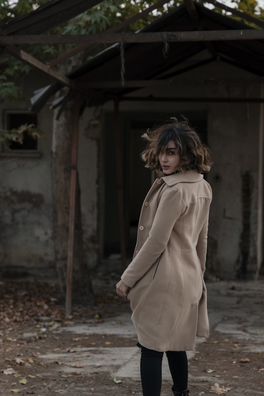 Atelier Wool-Cashmere Coat in camel, walking three-quarter portrait