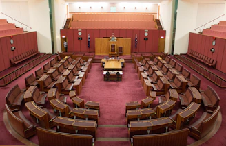 a large room filled with lots of wooden furniture
