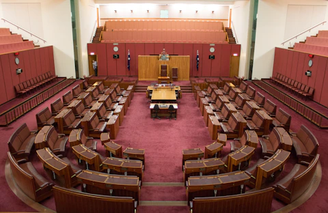 a large room filled with lots of wooden furniture