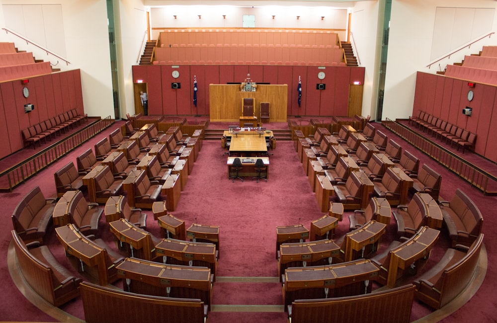 a large room filled with lots of wooden furniture