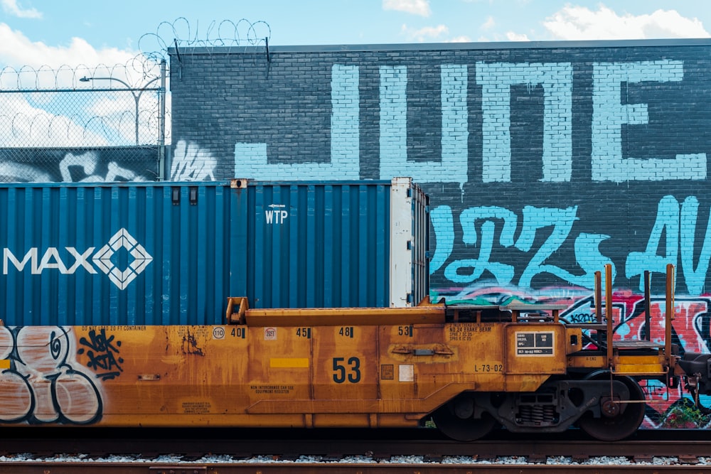 a train car with graffiti on the side of it