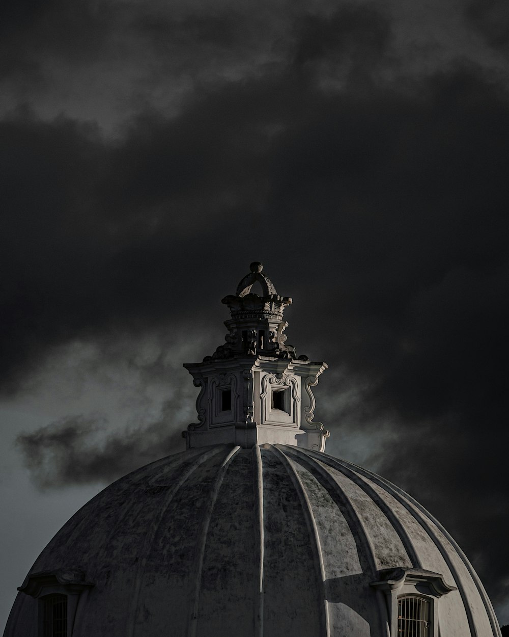 a large dome with a clock on top of it