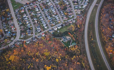 an aerial view of a city with lots of trees