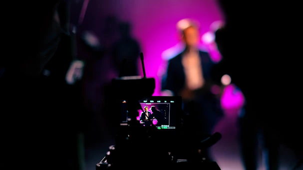 a person taking a picture with a camera