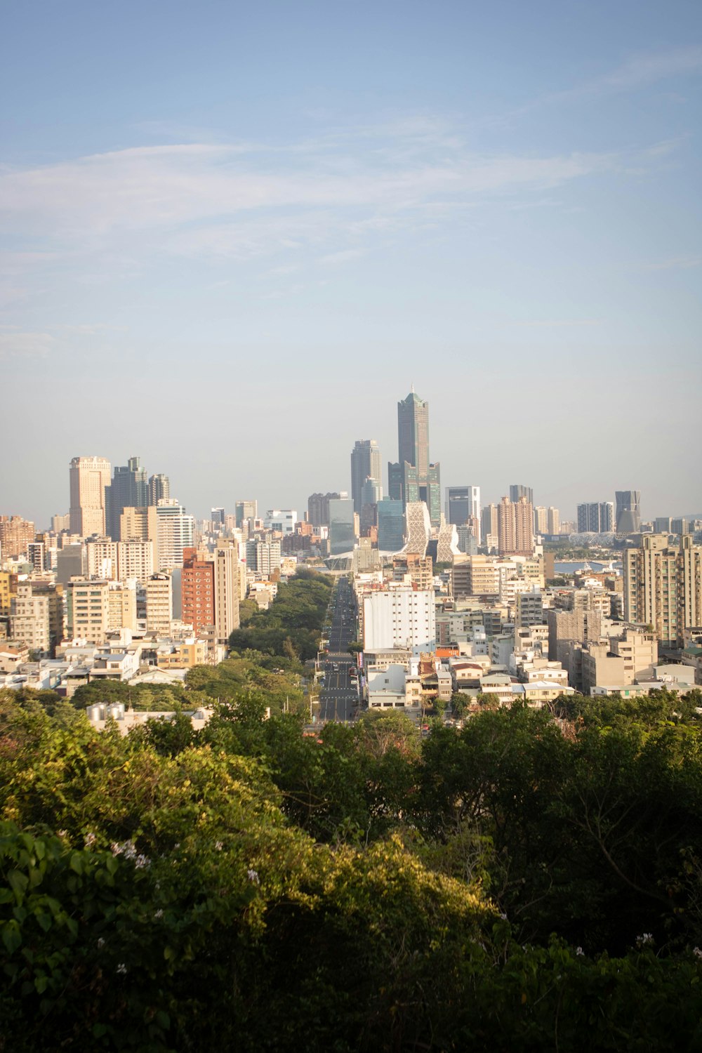 a view of a city from the top of a hill