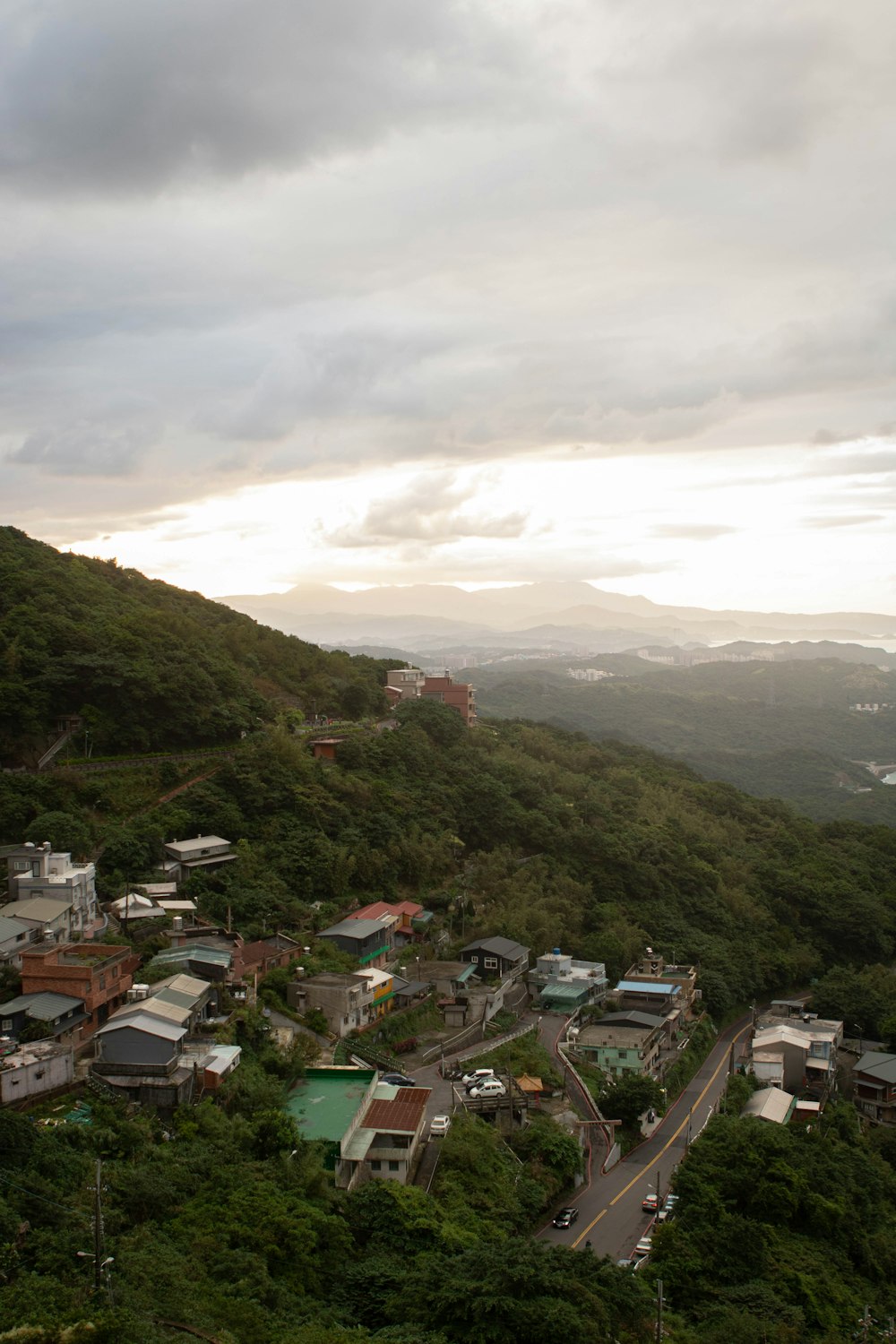 a view of a town on the side of a hill