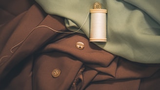 a spool of thread sits on top of a jacket
