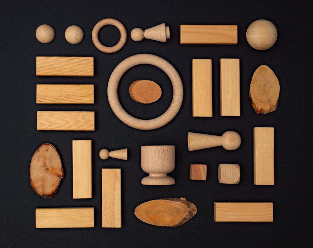 a collection of woodworking tools on a black background