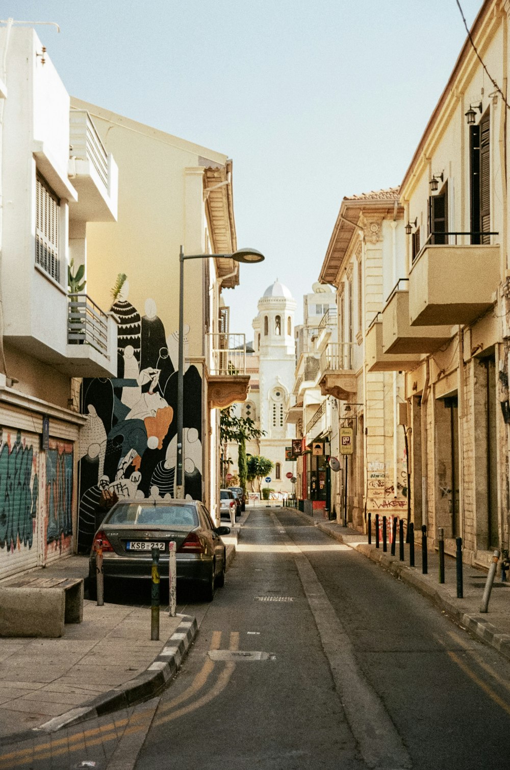 a car parked on the side of a street