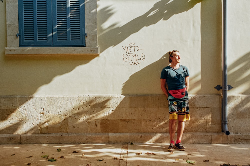 a man standing in front of a building