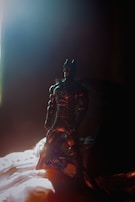 3D printed figure in action pose with subtle shadows emphasizing its modern design.