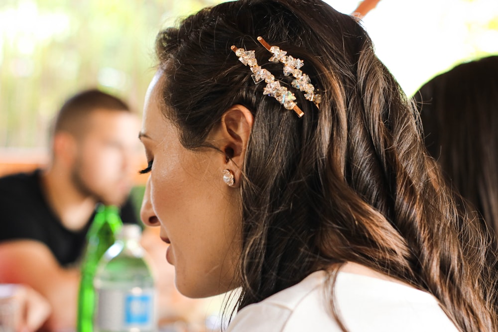 a woman with a hair clip in her hair