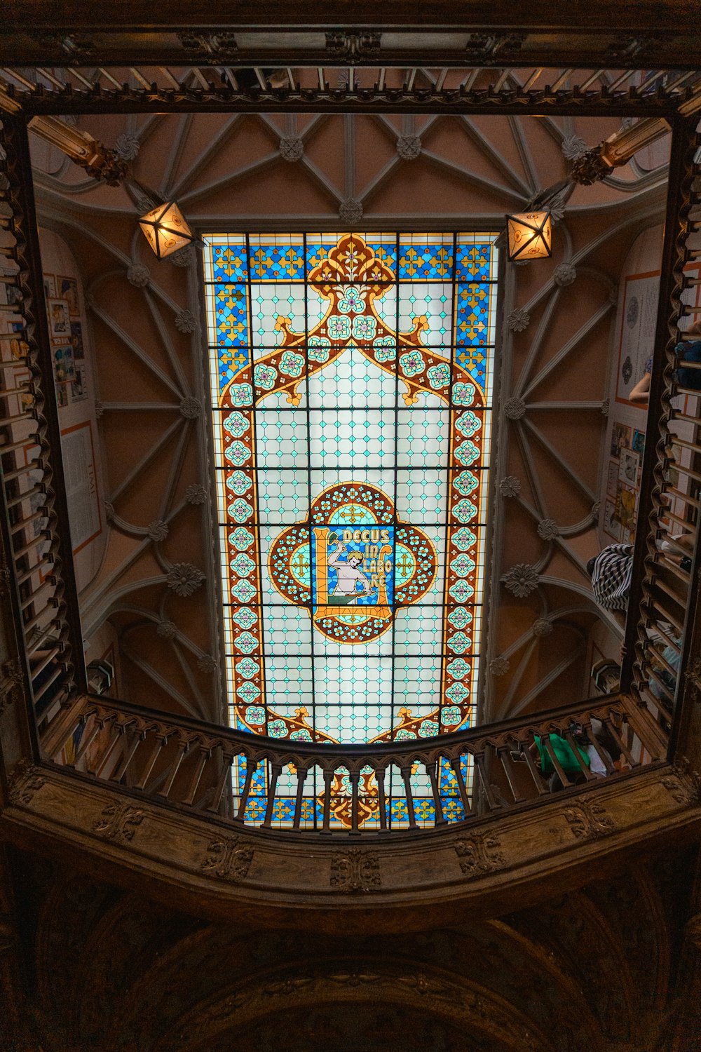 a stained glass window in the ceiling of a building