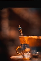 Close-up of a finely carved ice cup with intricate patterns.