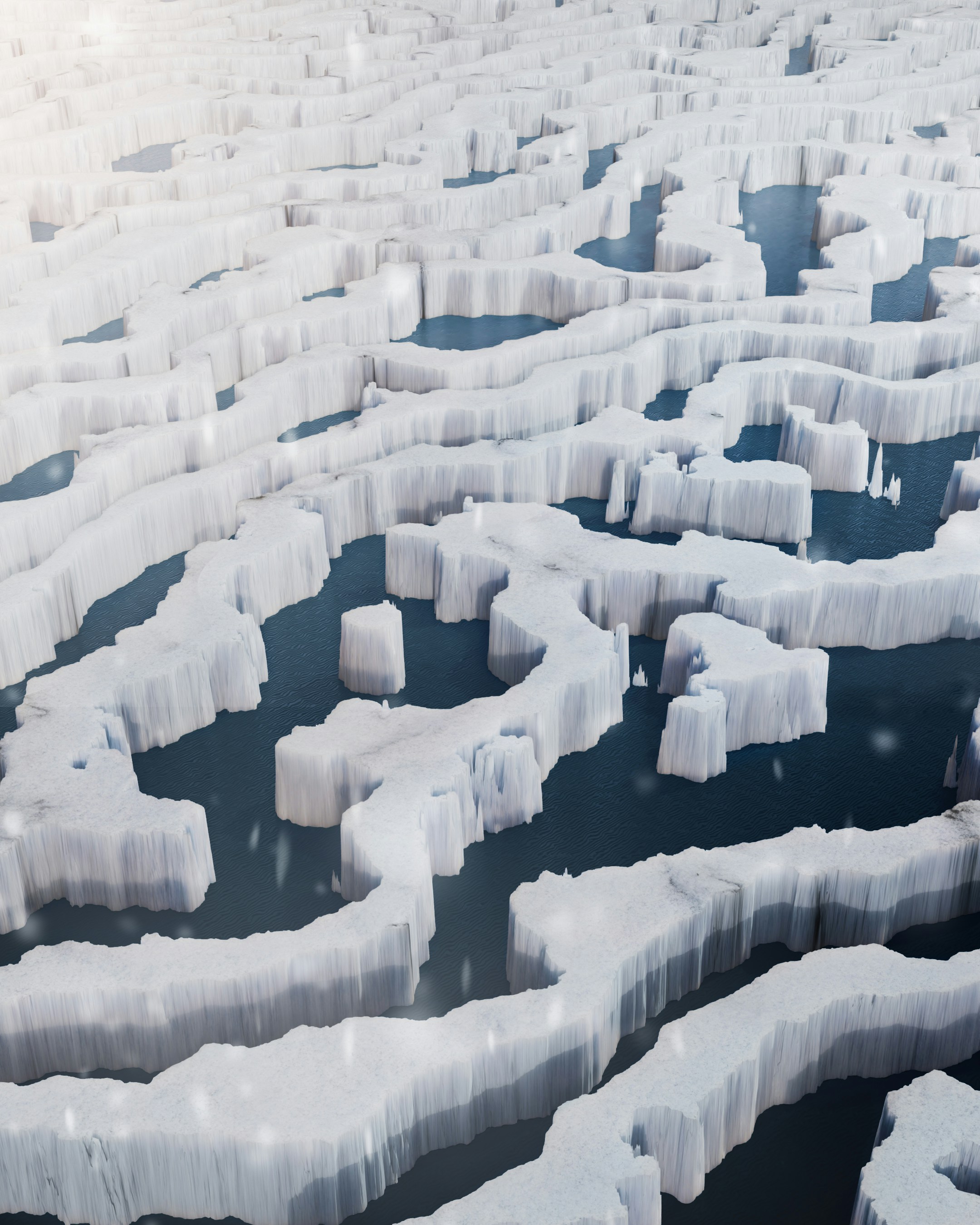 Aerial view of Greenland glacier with deep blue meltwater channels cutting through ancient ice