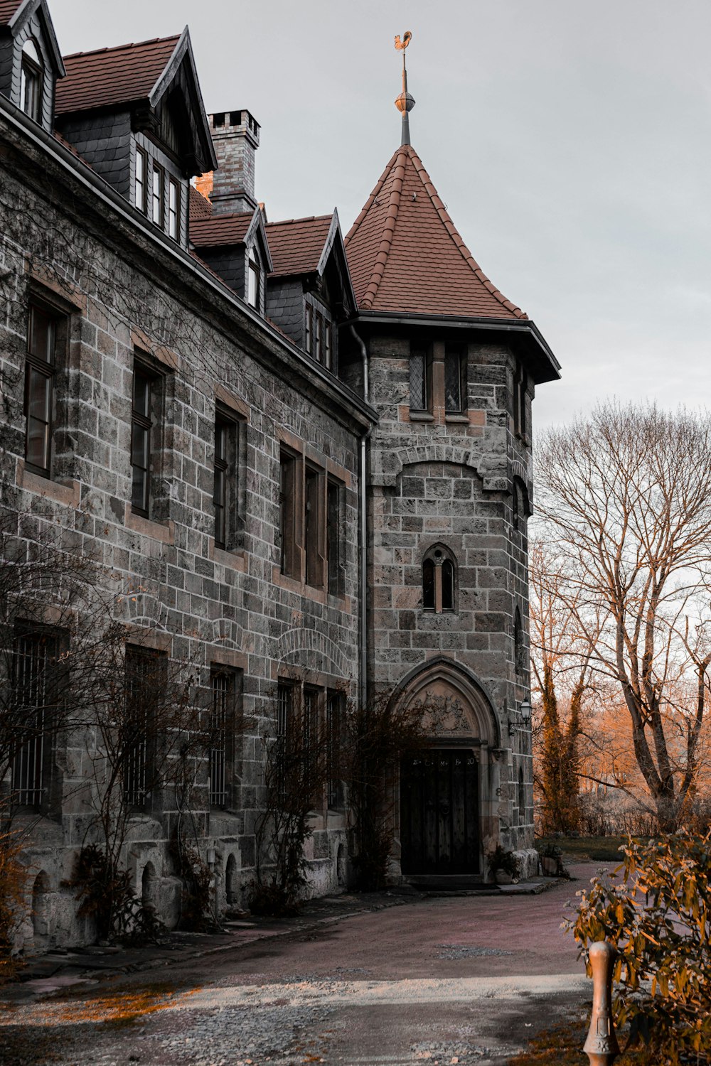 a stone building with a clock tower on top of it