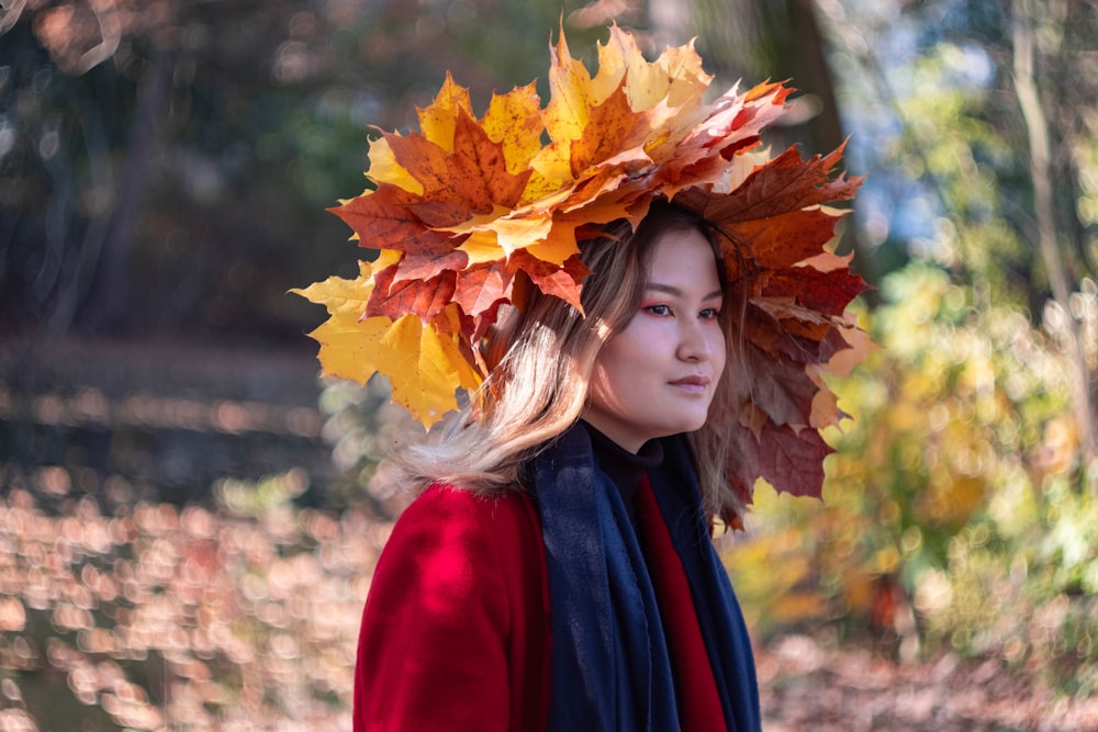 a woman with a wreath of leaves on her head