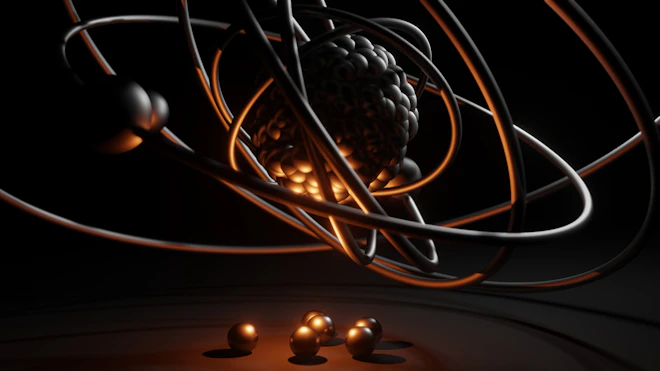a bunch of balls and wires in the dark
