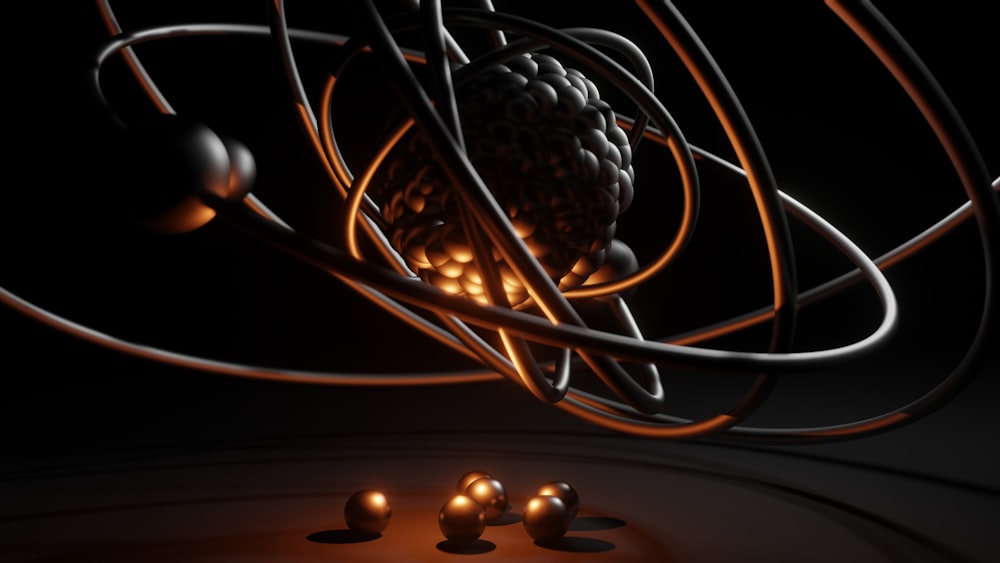 a bunch of balls and wires in the dark