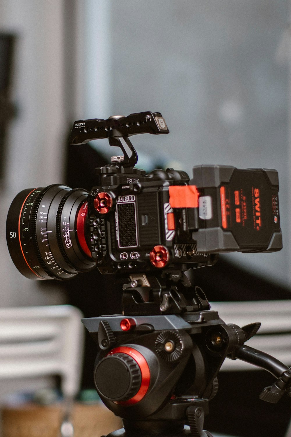 a video camera sitting on top of a tripod