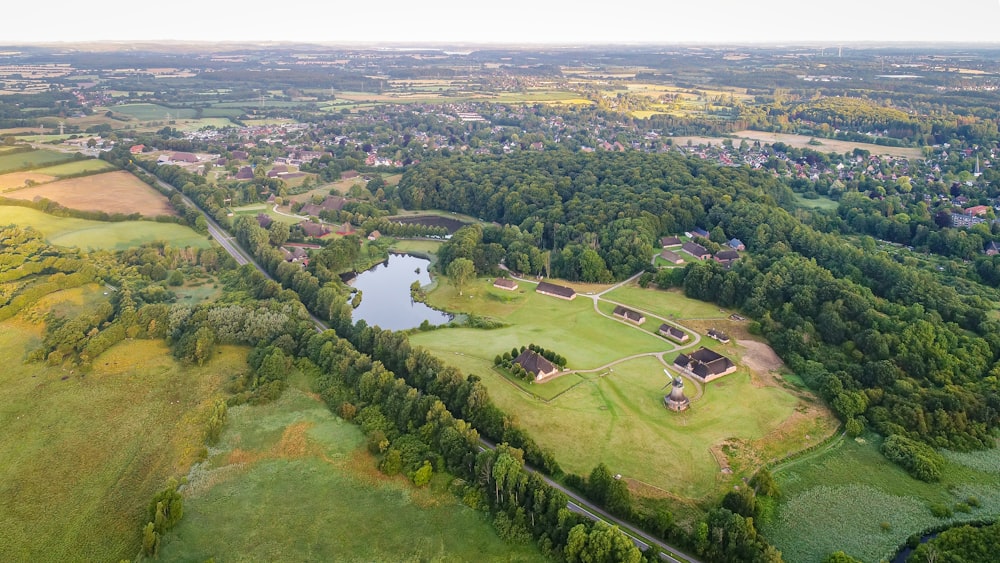 an aerial view of a large green field