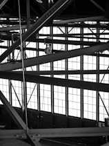 a black and white photo of a metal structure