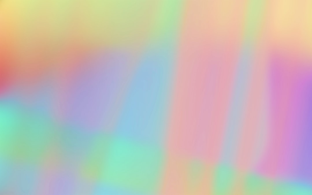 a blurry image of an orange and pink object,