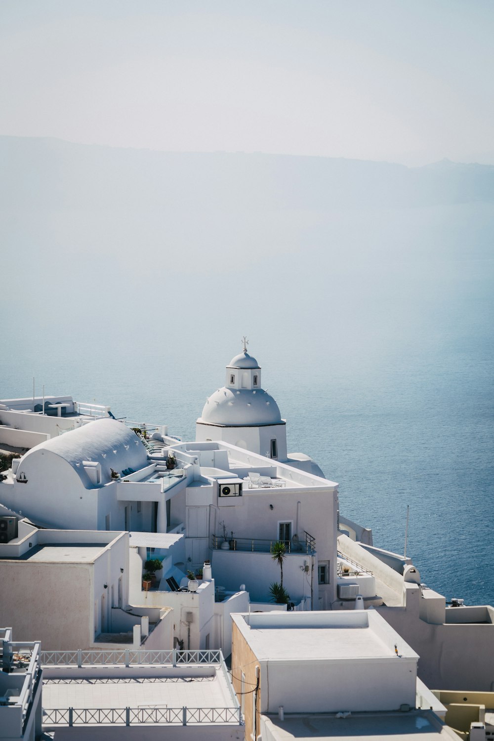 a white building with a white dome on top of it