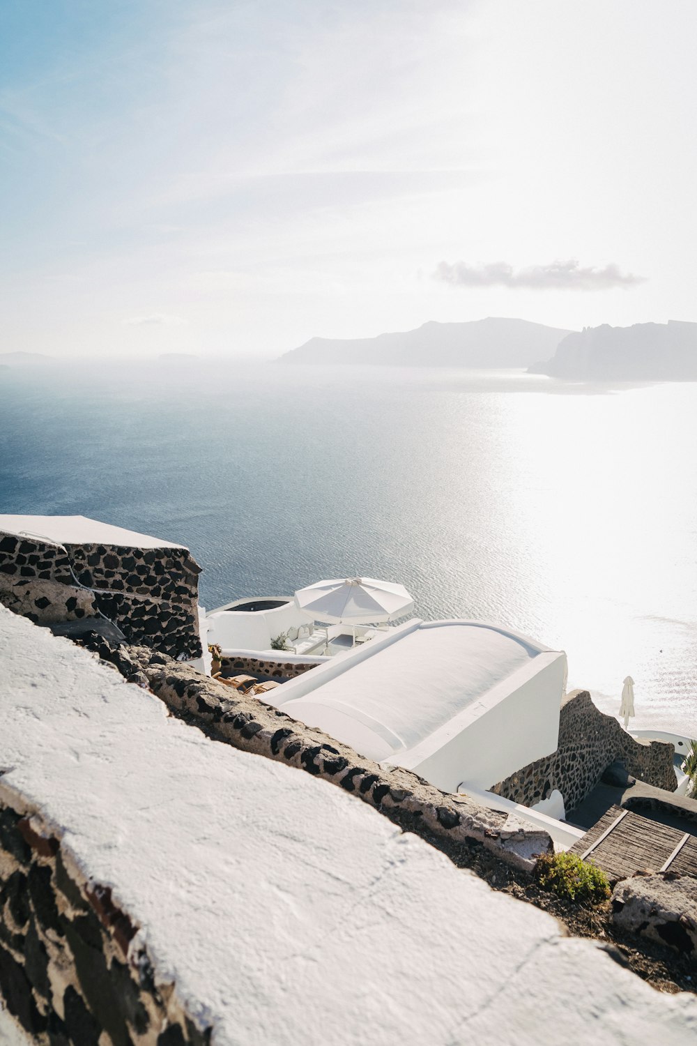 a view of the ocean from the top of a building