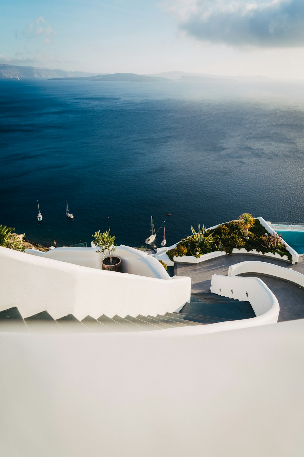 a view of the ocean from the top of a building