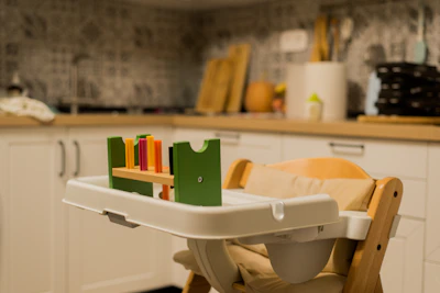 a child's high chair in a kitchen