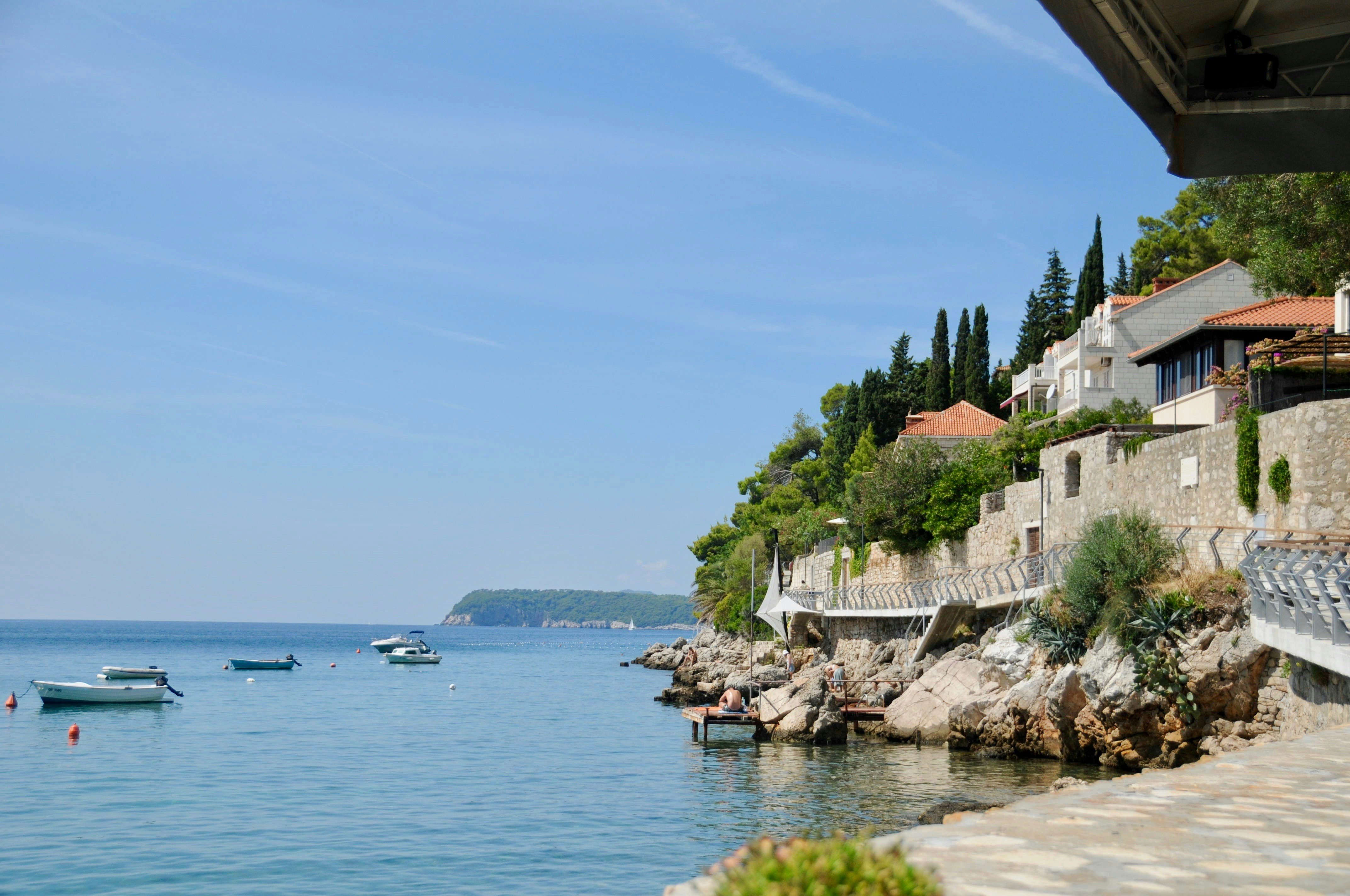 A body of water with boats floating on top of it