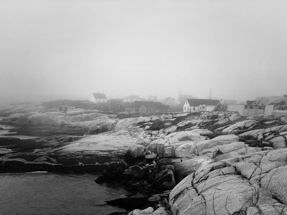 a black and white photo of a rocky shoreline