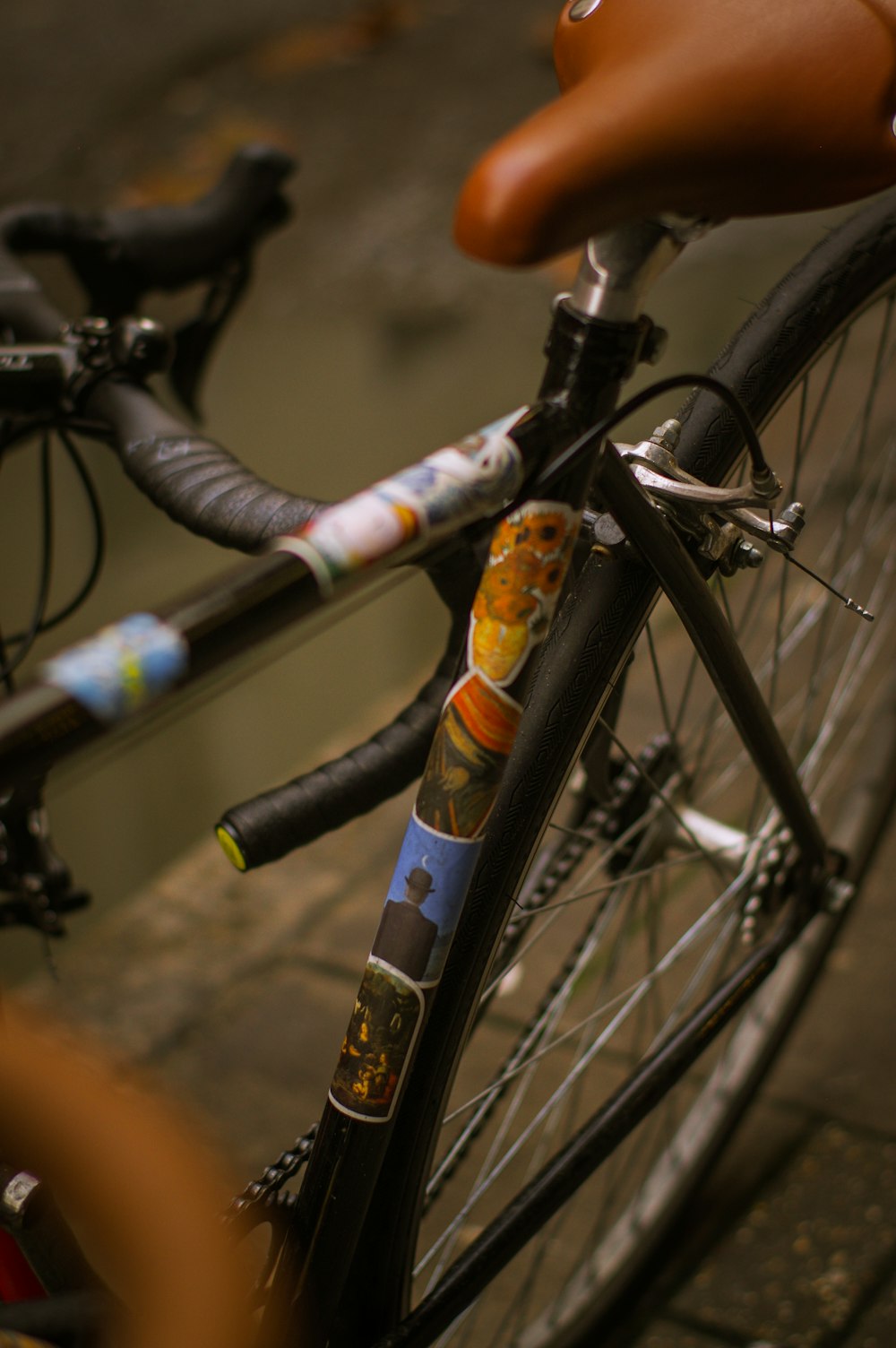 a close up of a bicycle parked on a street