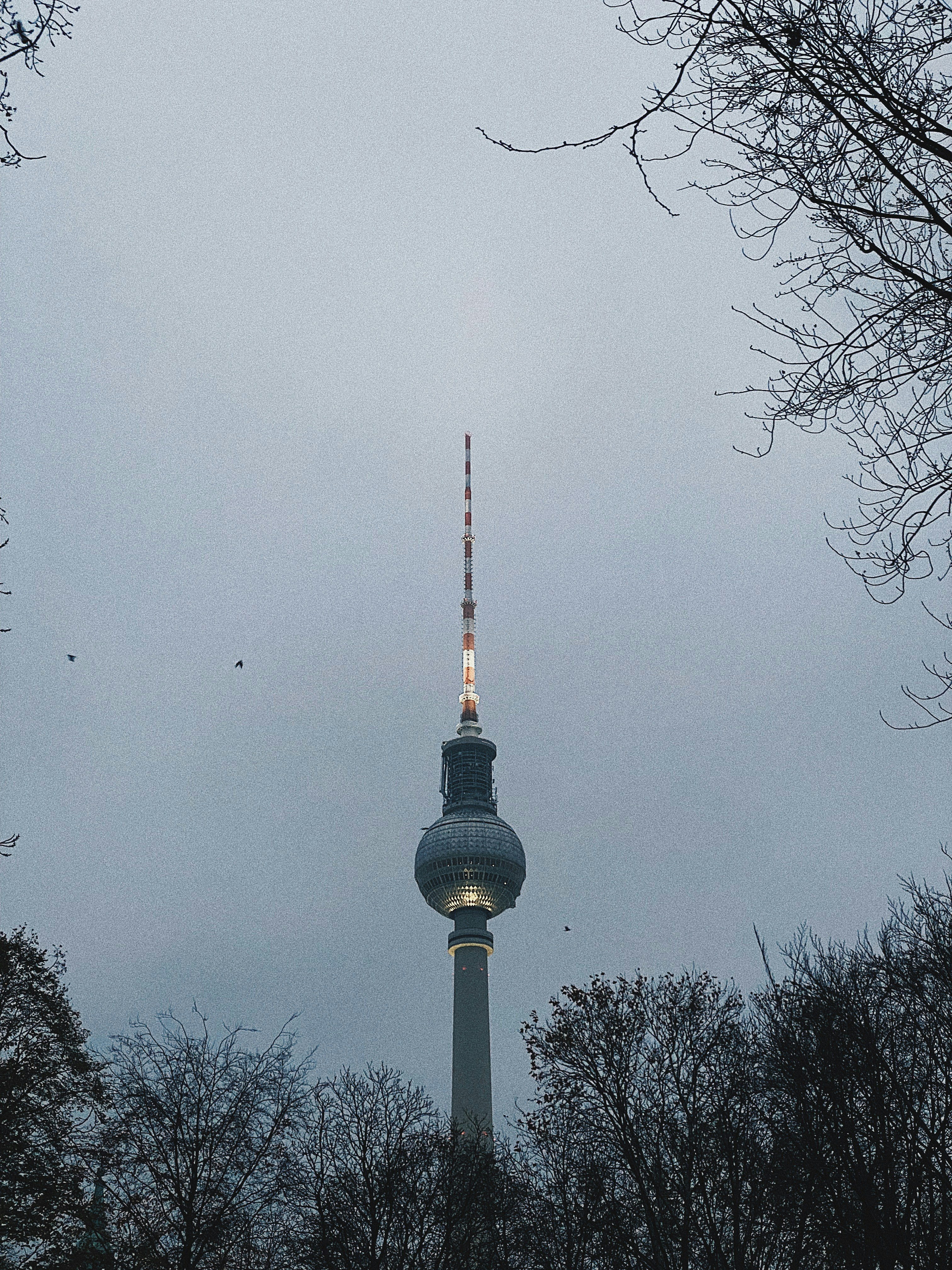 a very tall tower with a sky background