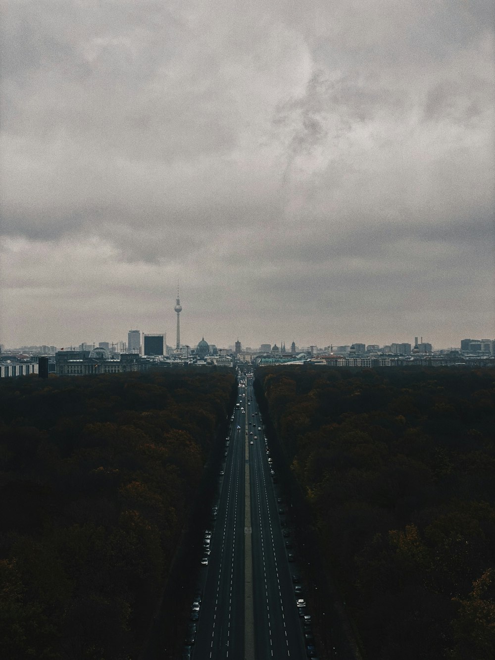 an aerial view of a highway in the middle of a city