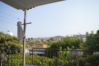 A balcony with a view in a rental property.