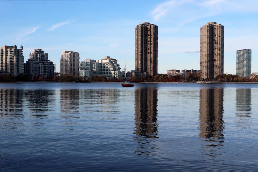 a body of water surrounded by tall buildings