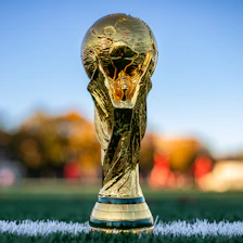 a close up of a soccer ball on a field