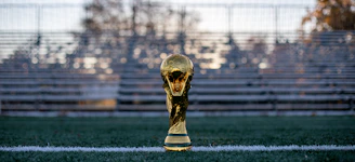 a soccer ball sitting on top of a soccer field