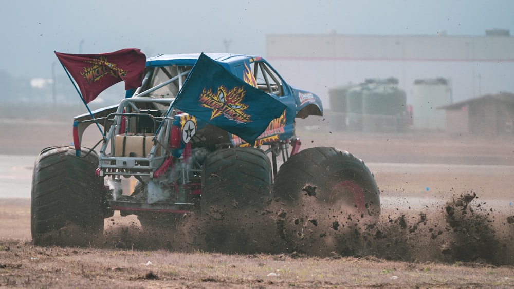 a monster truck with a flag on top of it