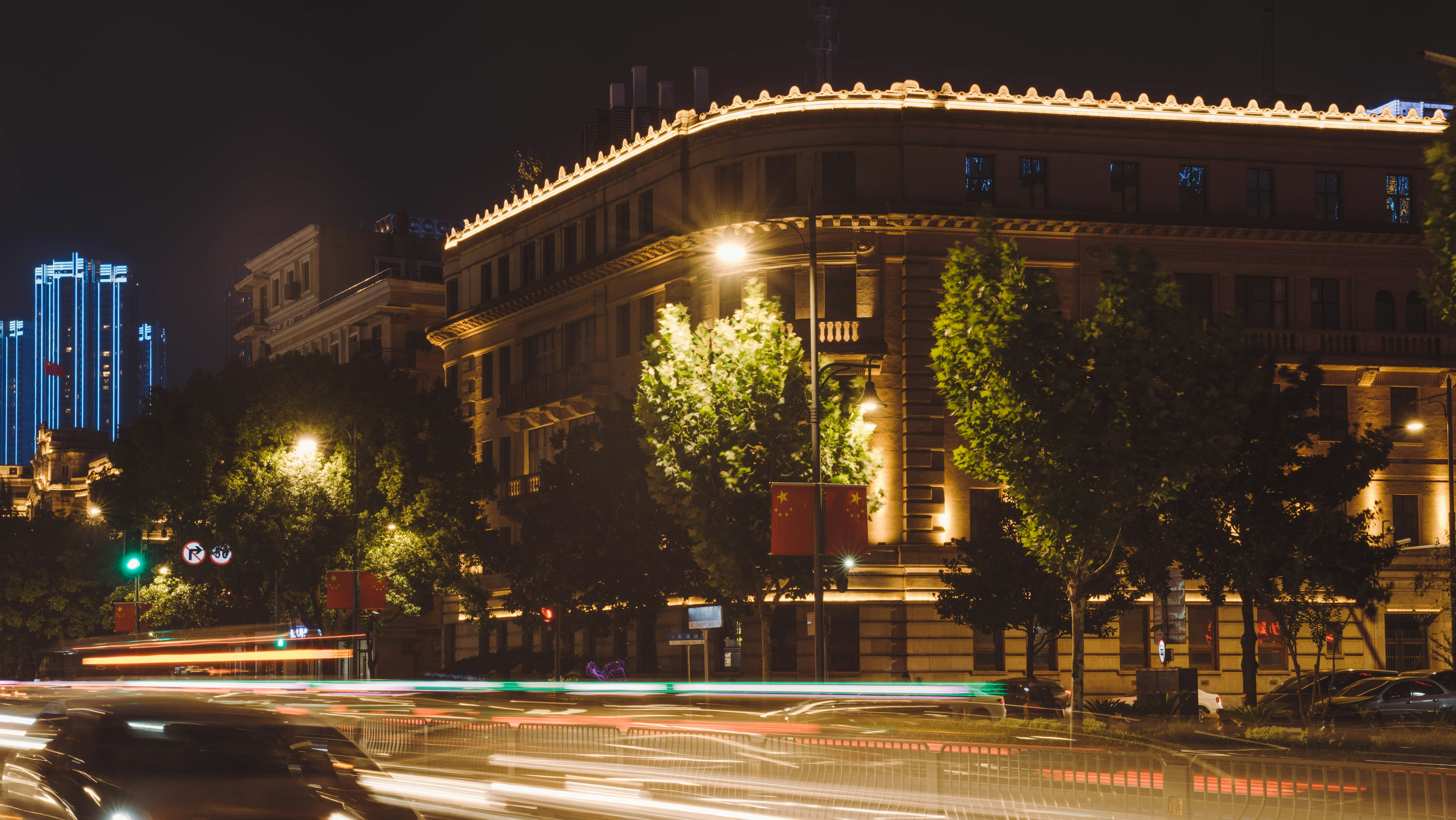 The iconic Aragon Ballroom marquee at night, illuminated against the urban backdrop - uptown chicago zip code