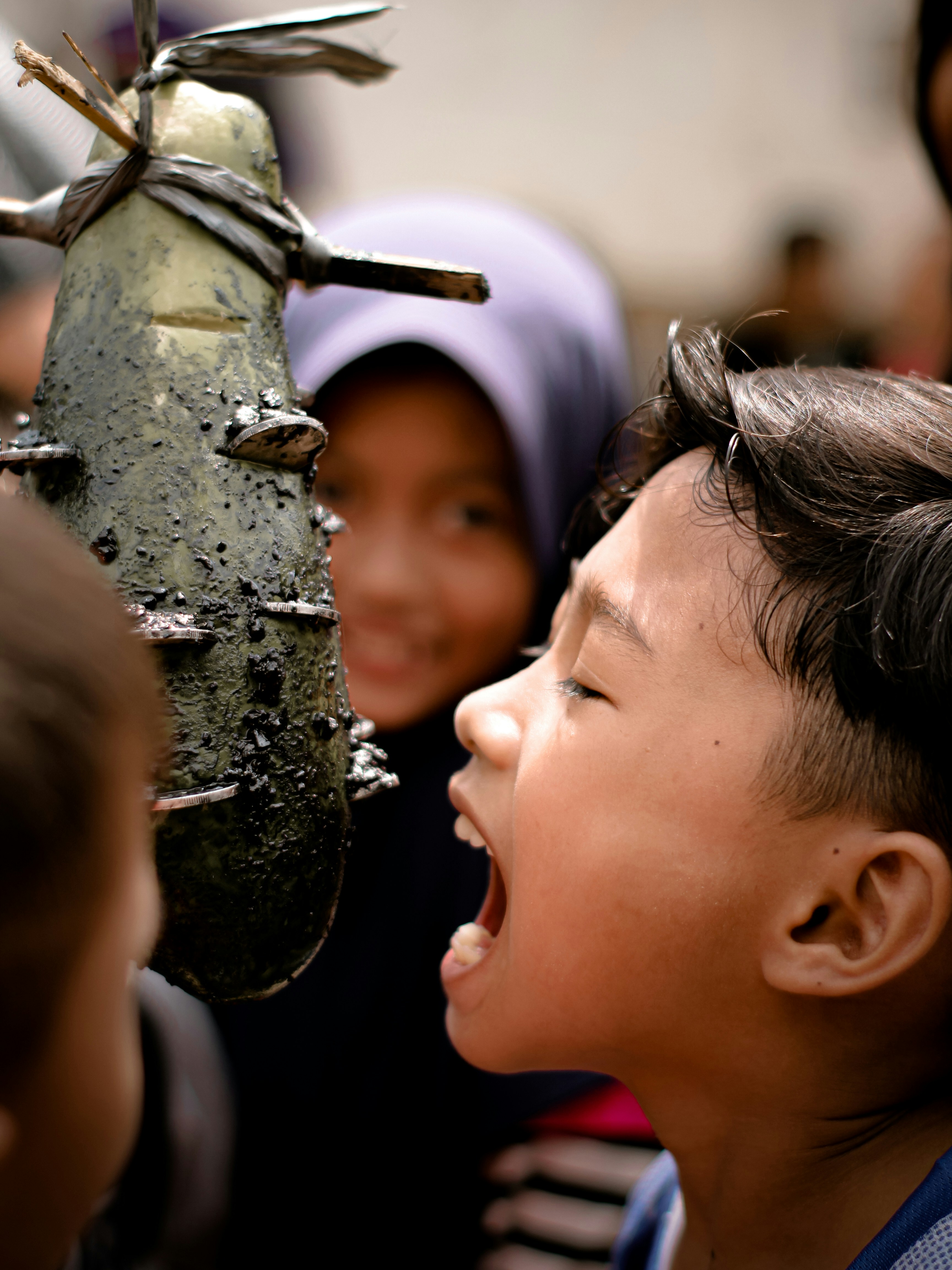 a group of young children standing next to each other