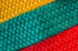 A close-up of a fabric sample showcasing various colors and textures.