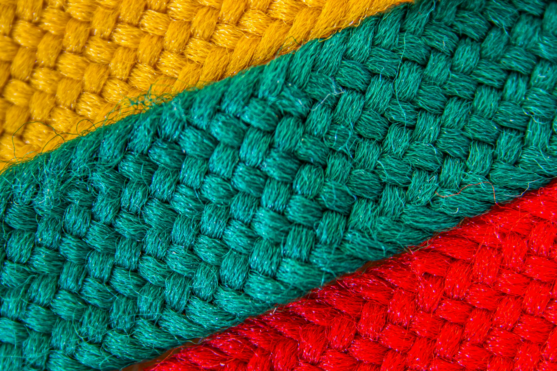 A close-up of trendy clothing fabrics showcasing vibrant colors and modern patterns.