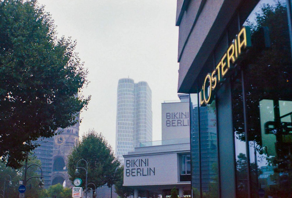 a view of a street with a building in the background