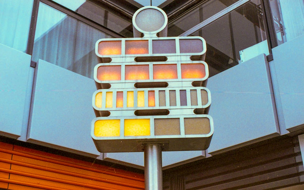 a street sign with a building in the background